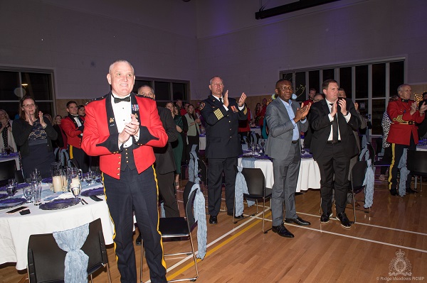 Picture of BC RCMP members and Maple Ridge city officials at RIdge Meadows RCMP Awards Night