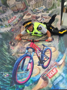 Staff Sgt Perceival riding a bike in graffiti art