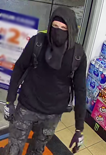 Can you identify this robbery suspect ?