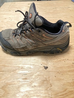 photo of brown merrell hiking shoe