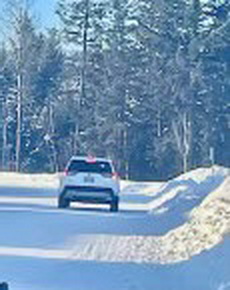 Photo of the white SUV police officers are looking to identify.